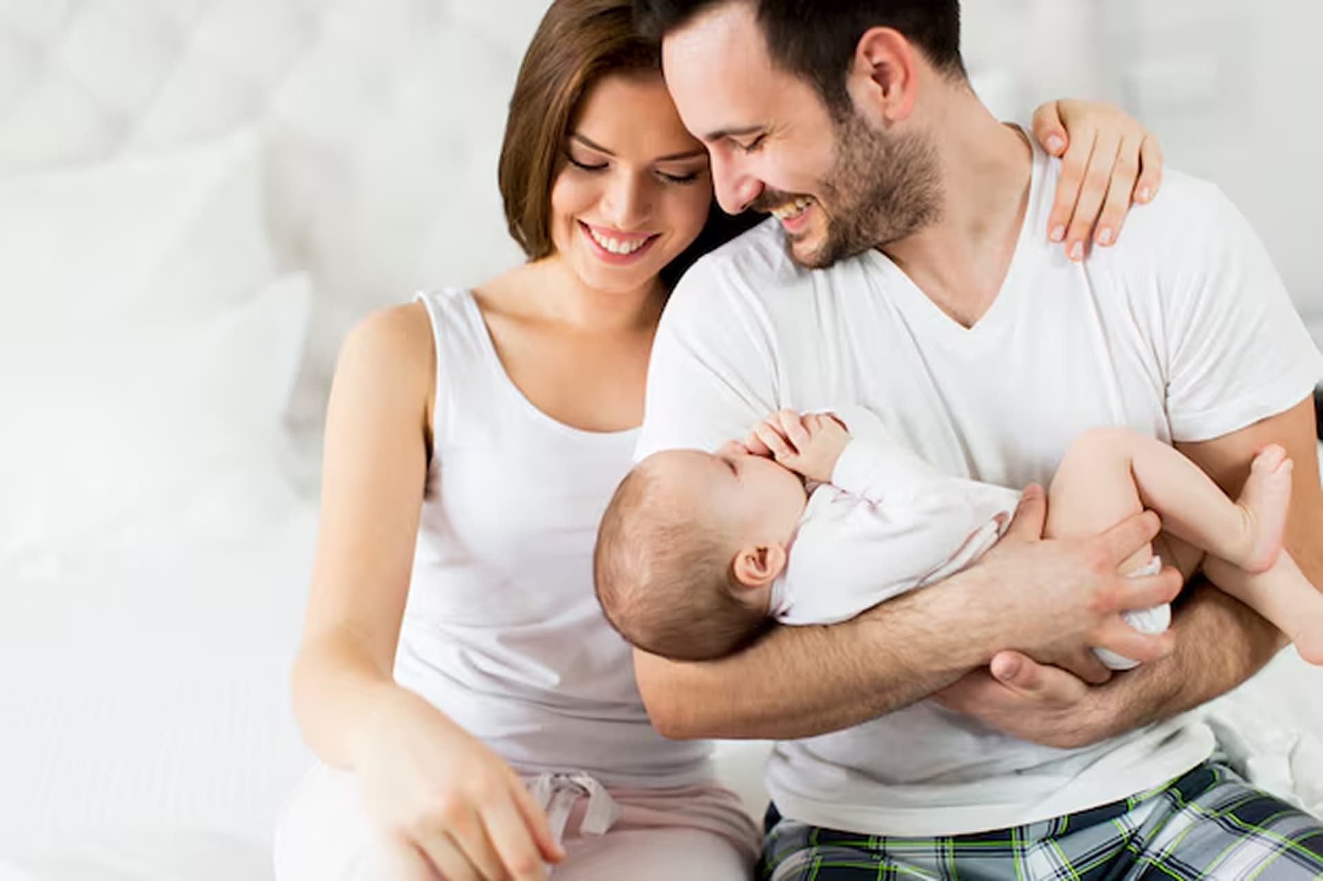 Happy couple with newborn baby